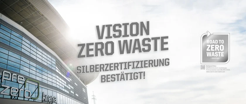 Vision Zero Waste - Silberzertifizierung bestätigt! vor einem Stadiongebäude mit einem Zertifikat für den Weg zu Zero Waste.
